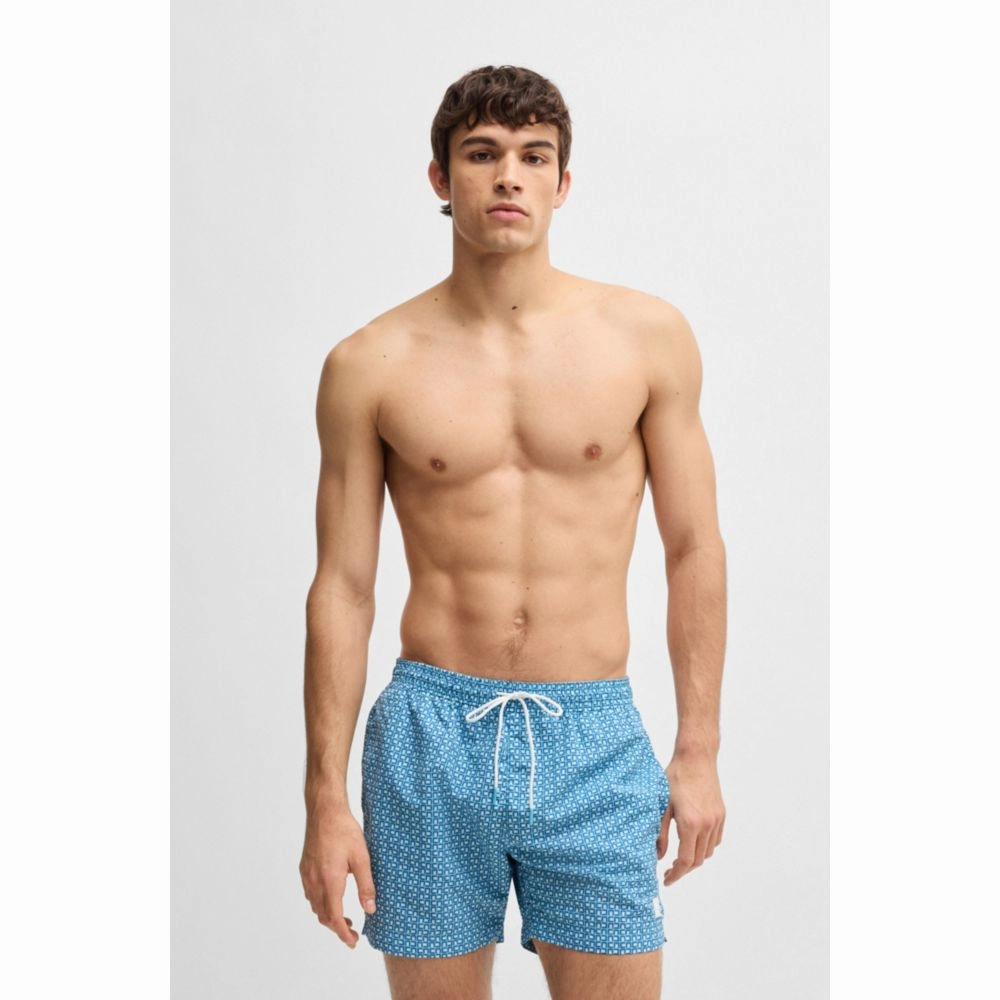 Drawstring-waist swim shorts with all-over print