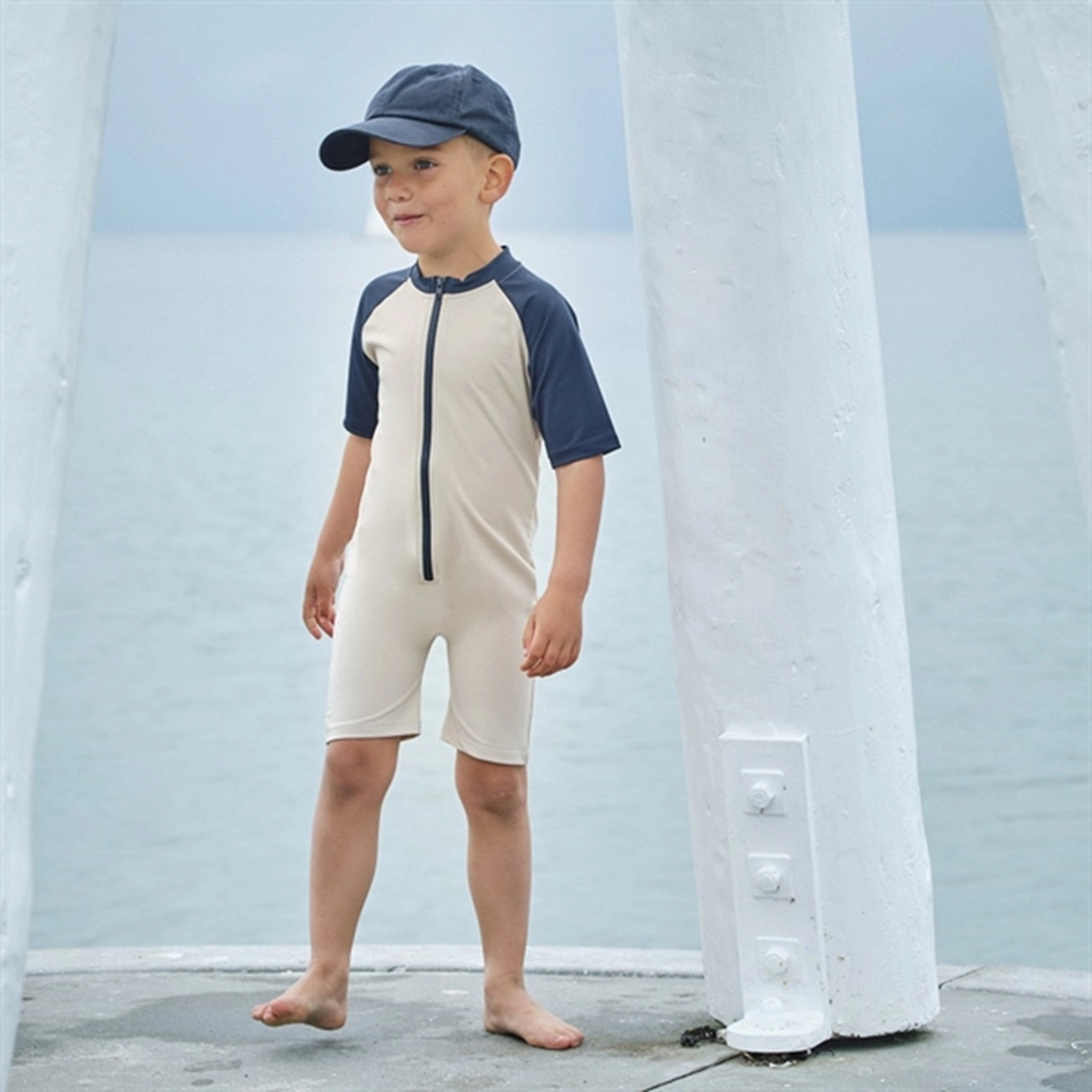 Petit Crabe Latte/Blue Multi Color Onesie with Zipper