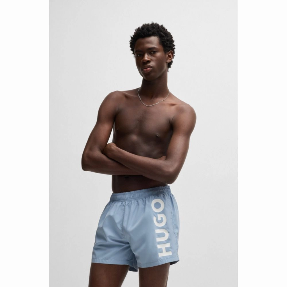 Quick-dry swim shorts with vertical logo print